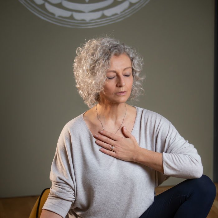In my very experiential classes I love to cultivate body awareness and the ability to connect through breath and deep listening.